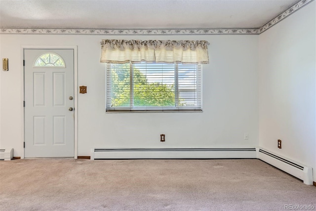 entryway with carpet flooring