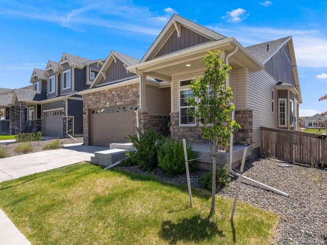 16448 E 111th Pl, Commerce City, CO 80022 - craftsman house featuring board and batten siding, stone siding, concrete driveway, an attached garage, and roof with shingles