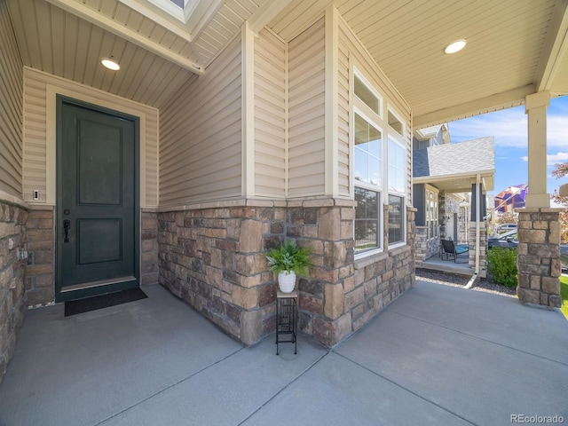 16448 E 111th Pl, Commerce City, CO 80022 - entrance to property with stone siding and a porch