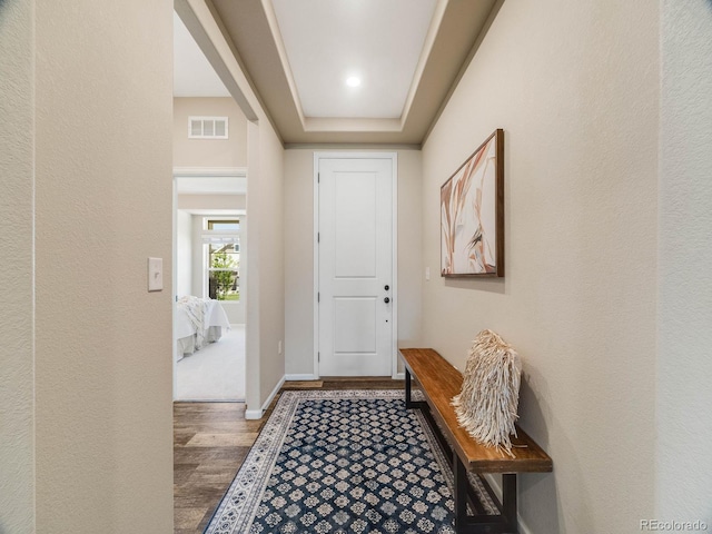 16448 E 111th Pl, Commerce City, CO 80022 - entryway featuring wood finished floors, baseboards, and a textured wall