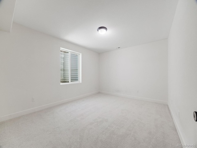 16448 E 111th Pl, Commerce City, CO 80022 - empty room featuring light carpet and baseboards