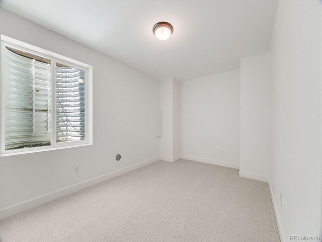 16448 E 111th Pl, Commerce City, CO 80022 - empty room with light carpet and baseboards