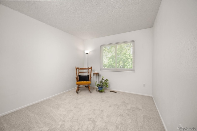 1245 Ceres Dr, Lafayette, CO 80026 - sitting room with carpet, a textured ceiling, and baseboards