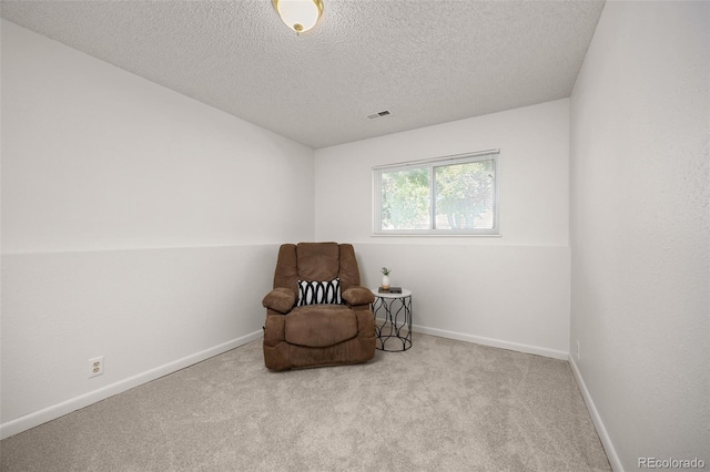 1245 Ceres Dr, Lafayette, CO 80026 - living area with carpet flooring, a textured ceiling, and baseboards