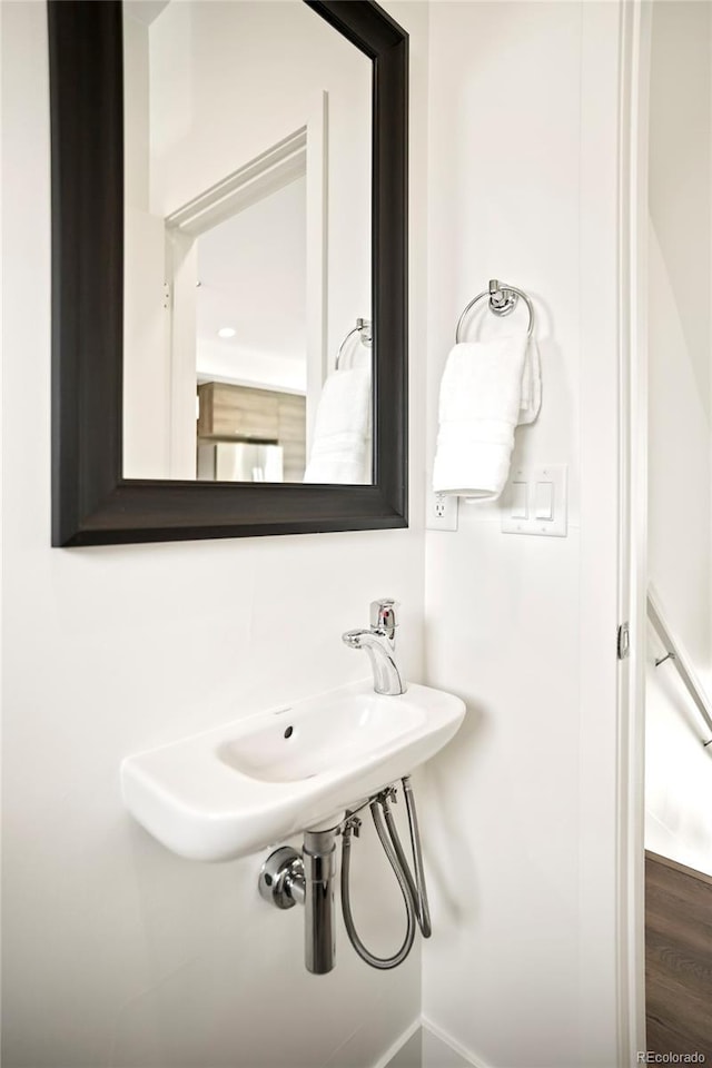 bathroom featuring wood finished floors