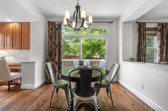 16207 Cadland Ct, Parker, CO 80134 - dining space featuring a chandelier, plenty of natural light, and dark wood-style flooring