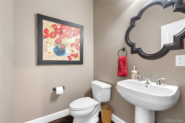 16207 Cadland Ct, Parker, CO 80134 - bathroom featuring baseboards and wood finished floors