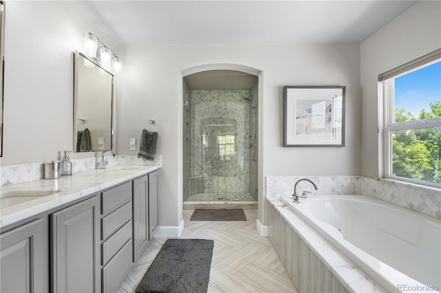 16207 Cadland Ct, Parker, CO 80134 - bathroom with a bath, double vanity, and a stall shower