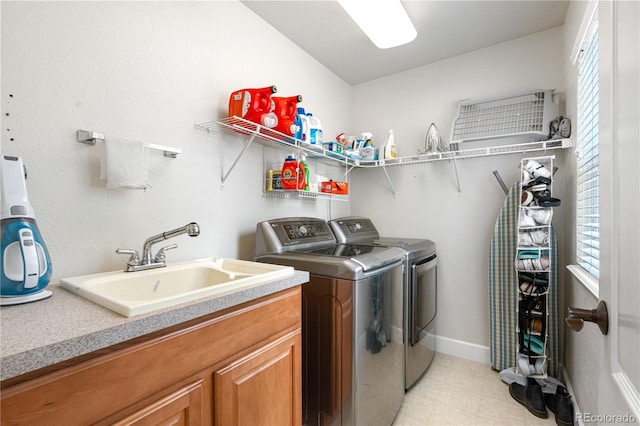 16207 Cadland Ct, Parker, CO 80134 - laundry room featuring washer and clothes dryer and cabinet space