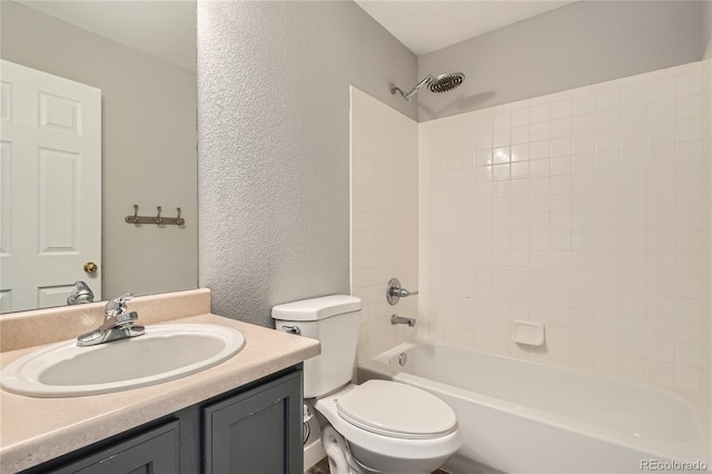 10626 Cherrybrook Cir, Highlands Ranch, CO 80126 - bathroom featuring vanity, a textured wall, and bathing tub / shower combination