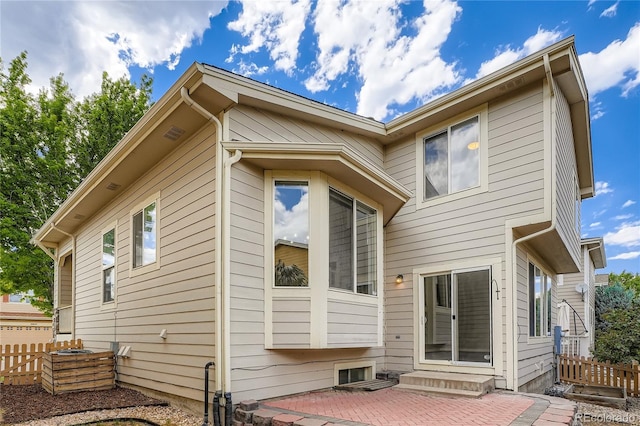 10626 Cherrybrook Cir, Highlands Ranch, CO 80126 - back of house with a patio area