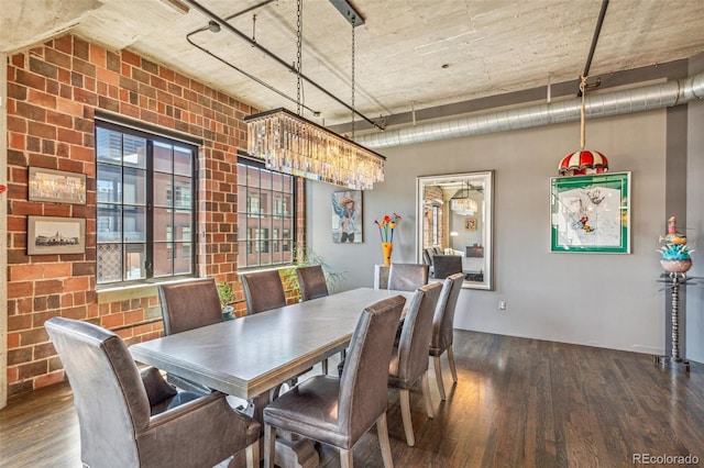 1863 Wazee St Unit 6B, Denver, CO 80202 - dining space with wood finished floors and brick wall