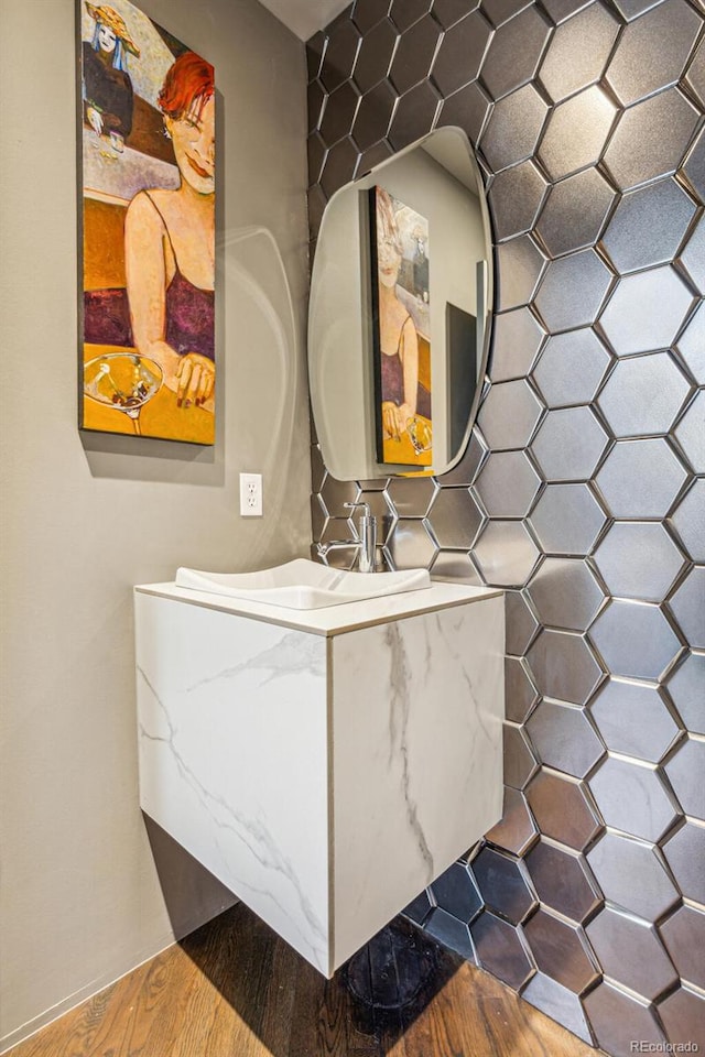 1863 Wazee St Unit 6B, Denver, CO 80202 - bathroom with wood finished floors and vanity