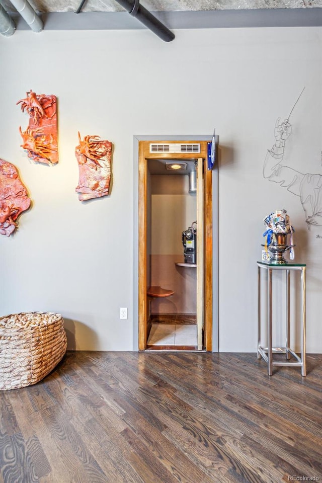 1863 Wazee St Unit 6B, Denver, CO 80202 - hallway featuring wood finished floors