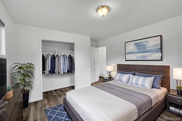 641 E 104th Pl, Northglenn, CO 80233 - bedroom featuring wood finished floors, a closet, and baseboards