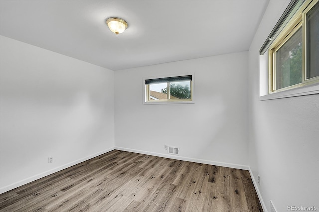 641 E 104th Pl, Northglenn, CO 80233 - unfurnished room with wood finished floors and baseboards
