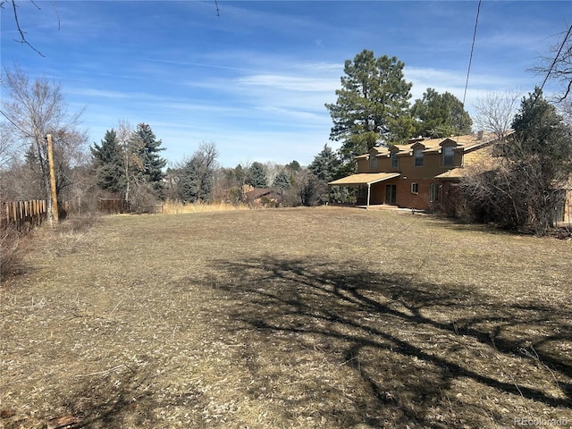 view of yard with fence