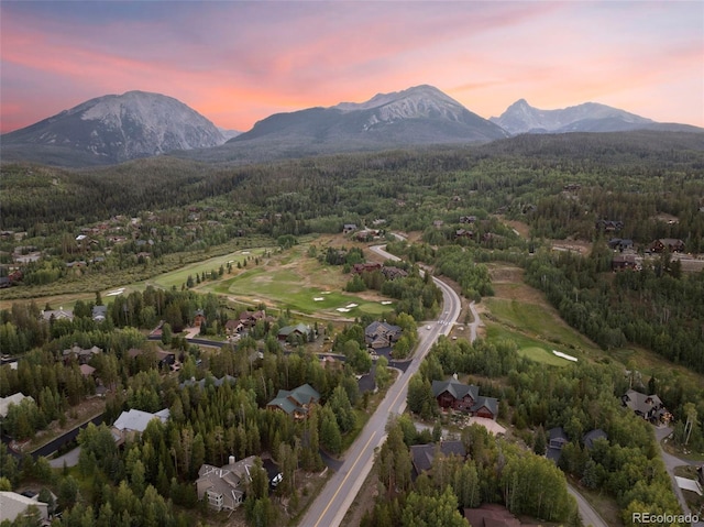 aerial view at dusk with a mountain view