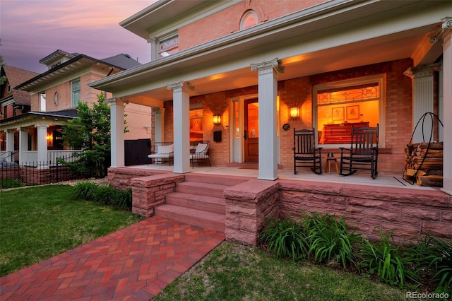 747 N Downing St, Denver, CO 80218 - view of patio featuring covered porch