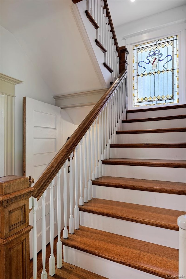 747 N Downing St, Denver, CO 80218 - stairway featuring vaulted ceiling and wood finished floors