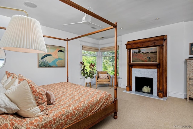747 N Downing St, Denver, CO 80218 - bedroom featuring carpet floors, a fireplace with raised hearth, and ceiling fan