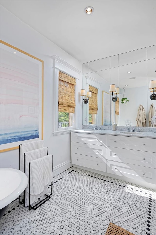 747 N Downing St, Denver, CO 80218 - full bathroom with vanity, baseboards, a soaking tub, a shower, and recessed lighting