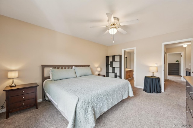 7474 E Arkansas Ave Unit 13-02, Denver, CO 80231 - carpeted bedroom with baseboards, ceiling fan, and ensuite bathroom
