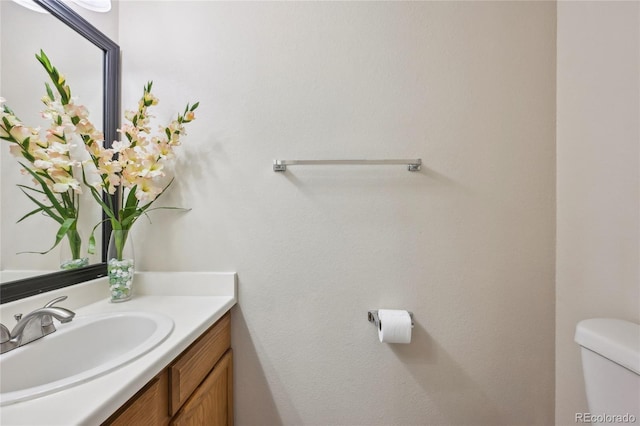 7474 E Arkansas Ave Unit 13-02, Denver, CO 80231 - half bath with vanity and toilet