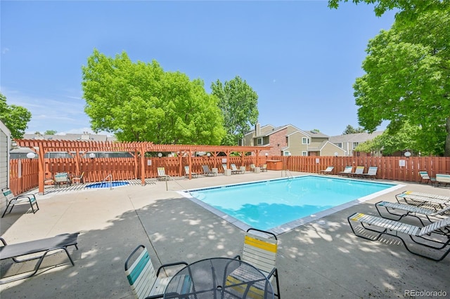 7474 E Arkansas Ave Unit 13-02, Denver, CO 80231 - community pool featuring a patio and a fenced backyard