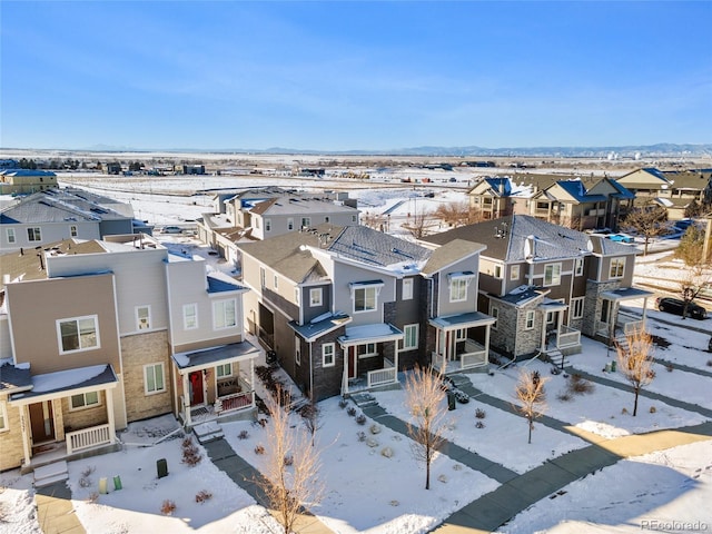 birds eye view of property with a residential view