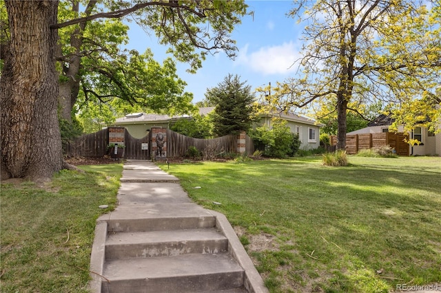 4567 Grove St, Denver, CO 80211 - view of yard with a gate