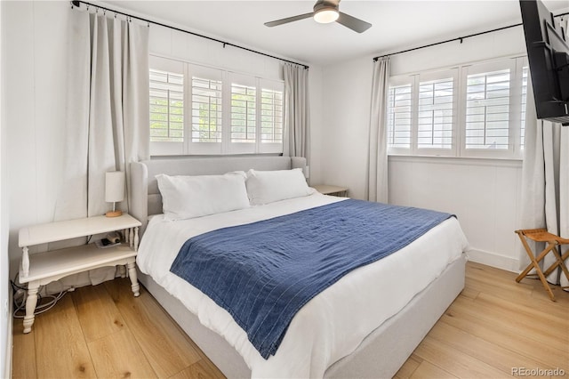 4567 Grove St, Denver, CO 80211 - bedroom with light wood-type flooring and a ceiling fan