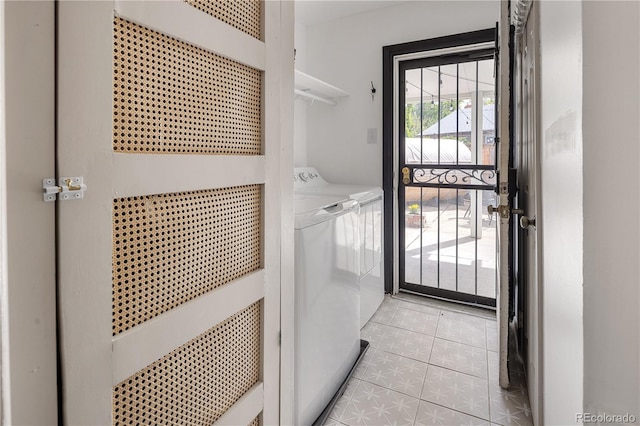 4567 Grove St, Denver, CO 80211 - laundry room with washing machine and clothes dryer, light tile patterned floors, and a heating unit