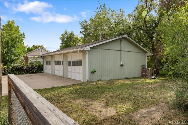 4567 Grove St, Denver, CO 80211 - view of side of property with a garage, an outbuilding, and a yard