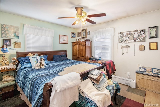 222 S Logan St, Grover, CO 80729 - bedroom featuring baseboard heating and ceiling fan