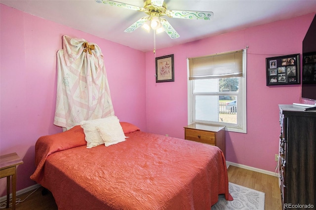 222 S Logan St, Grover, CO 80729 - bedroom with wood finished floors and a ceiling fan