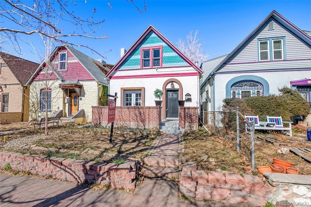 view of front of house with brick siding