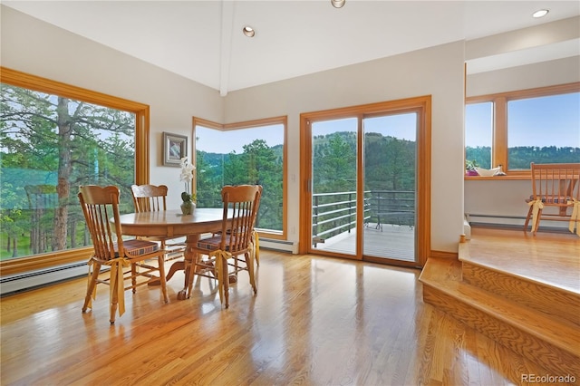 2398 Bitterroot Ln, Golden, CO 80401 - dining room featuring plenty of natural light, light wood finished floors, recessed lighting, and a baseboard heating unit