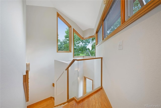2398 Bitterroot Ln, Golden, CO 80401 - stairs with wood finished floors and vaulted ceiling