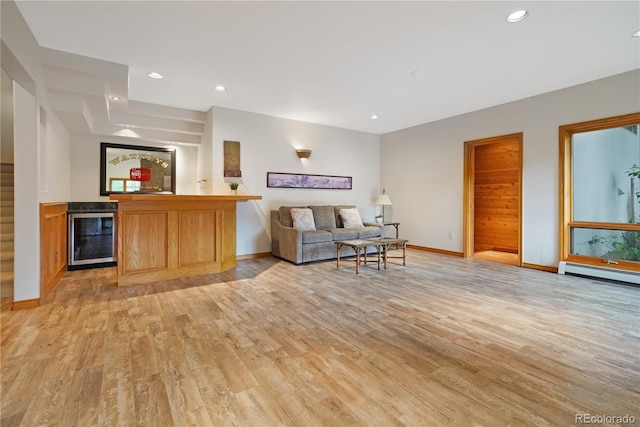 2398 Bitterroot Ln, Golden, CO 80401 - living room with beverage cooler, bar area, light wood-style floors, and recessed lighting