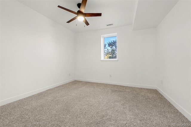 carpeted empty room with ceiling fan