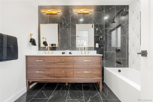 bathroom featuring vanity and tiled shower / bath combo