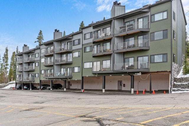 9876 Ryan Gulch Rd Unit F-206, Silverthorne, CO 80498 - view of apartment building / complex featuring parking