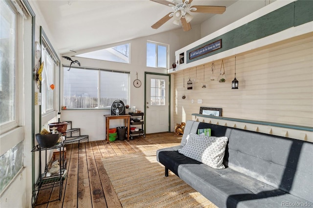 sunroom featuring vaulted ceiling and ceiling fan