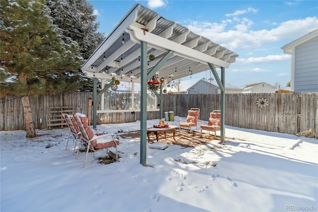 view of yard layered in snow