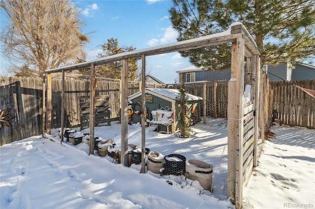 view of snow covered deck