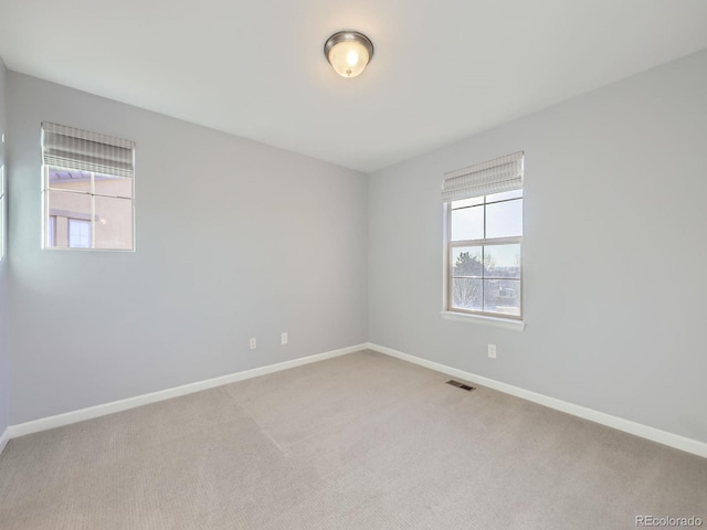 2256 S Isabell Ct, Lakewood, CO 80228 - unfurnished room featuring plenty of natural light, baseboards, and carpet