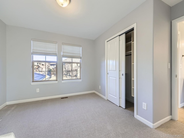 2256 S Isabell Ct, Lakewood, CO 80228 - unfurnished bedroom with carpet floors, baseboards, and a closet