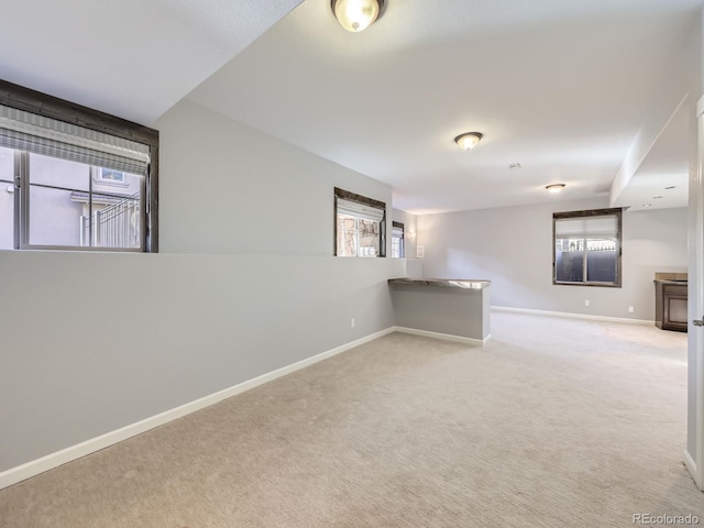 2256 S Isabell Ct, Lakewood, CO 80228 - empty room featuring healthy amount of natural light, baseboards, and carpet flooring