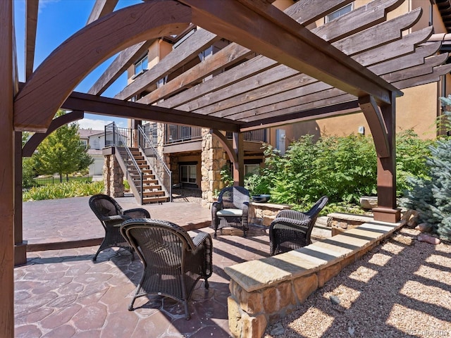 2256 S Isabell Ct, Lakewood, CO 80228 - view of patio / terrace featuring a pergola and stairs